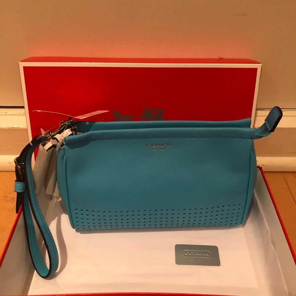 Coach Turquoise leather wristlet with strap. NWT